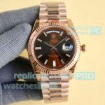 Replica Rolex Day-Date 40mm Citizen 8215 Brown Baguette Diamond Dial Rose Gold Watch